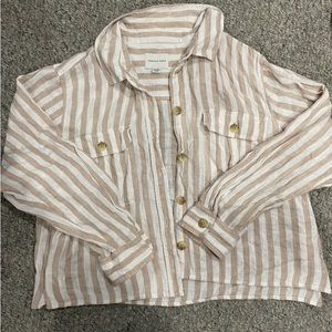 Women’s tan and white shirt